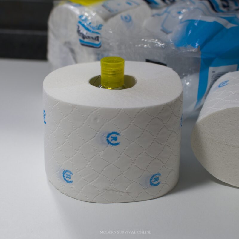 roll of toilet paper with hand sanitizer inside its cylinder