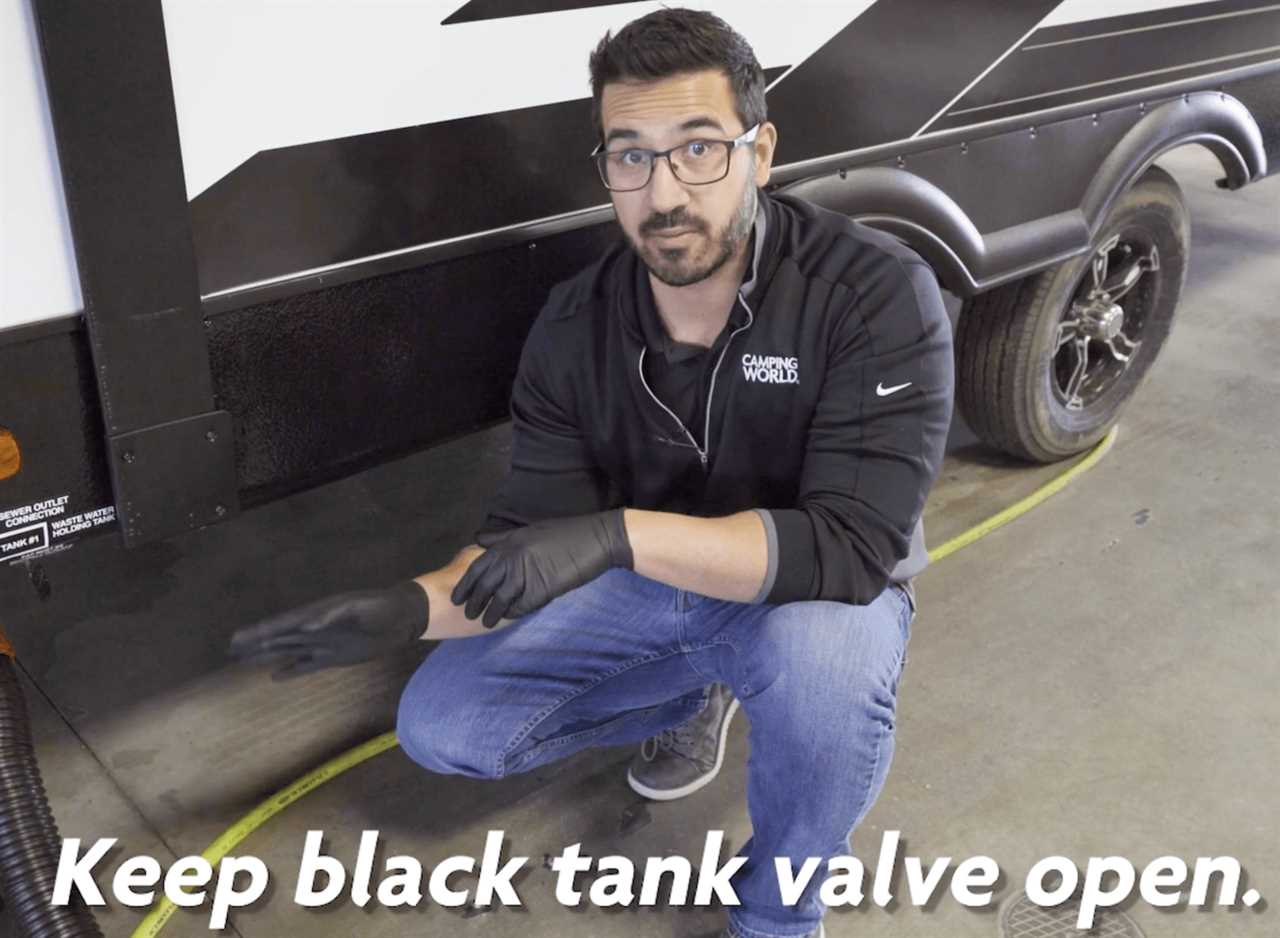 black-handle-open-how-to-use-rv-black-tank-flush-04-2022 