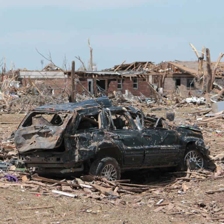 crushed car after tornado