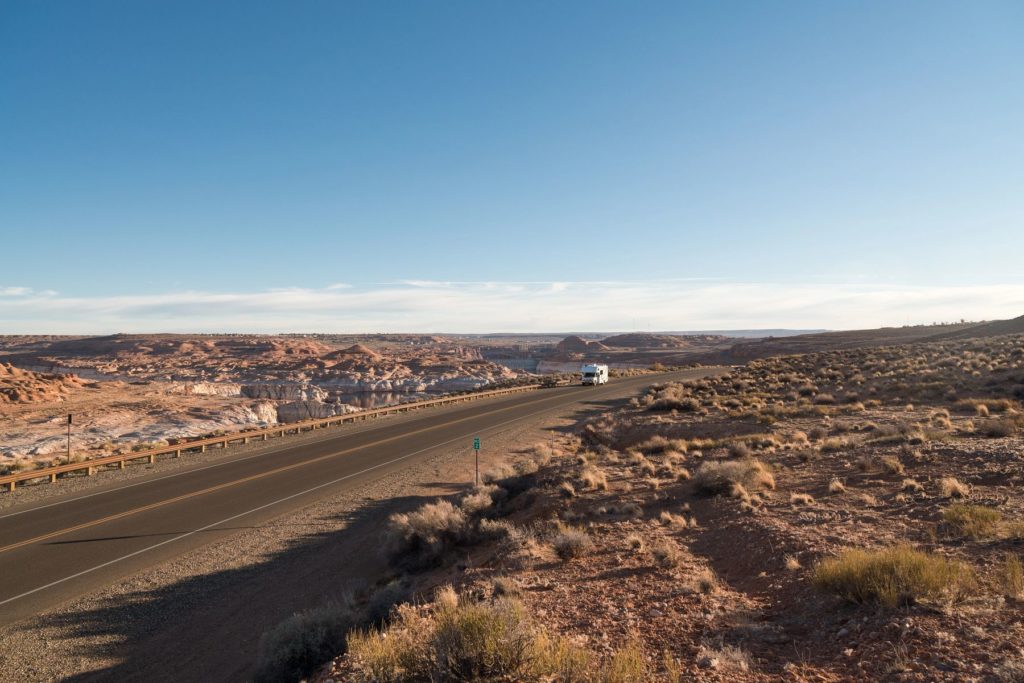 RV Driving Along Backroad Landscape