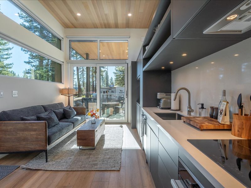 A camping cabin interior with wooden floors. 