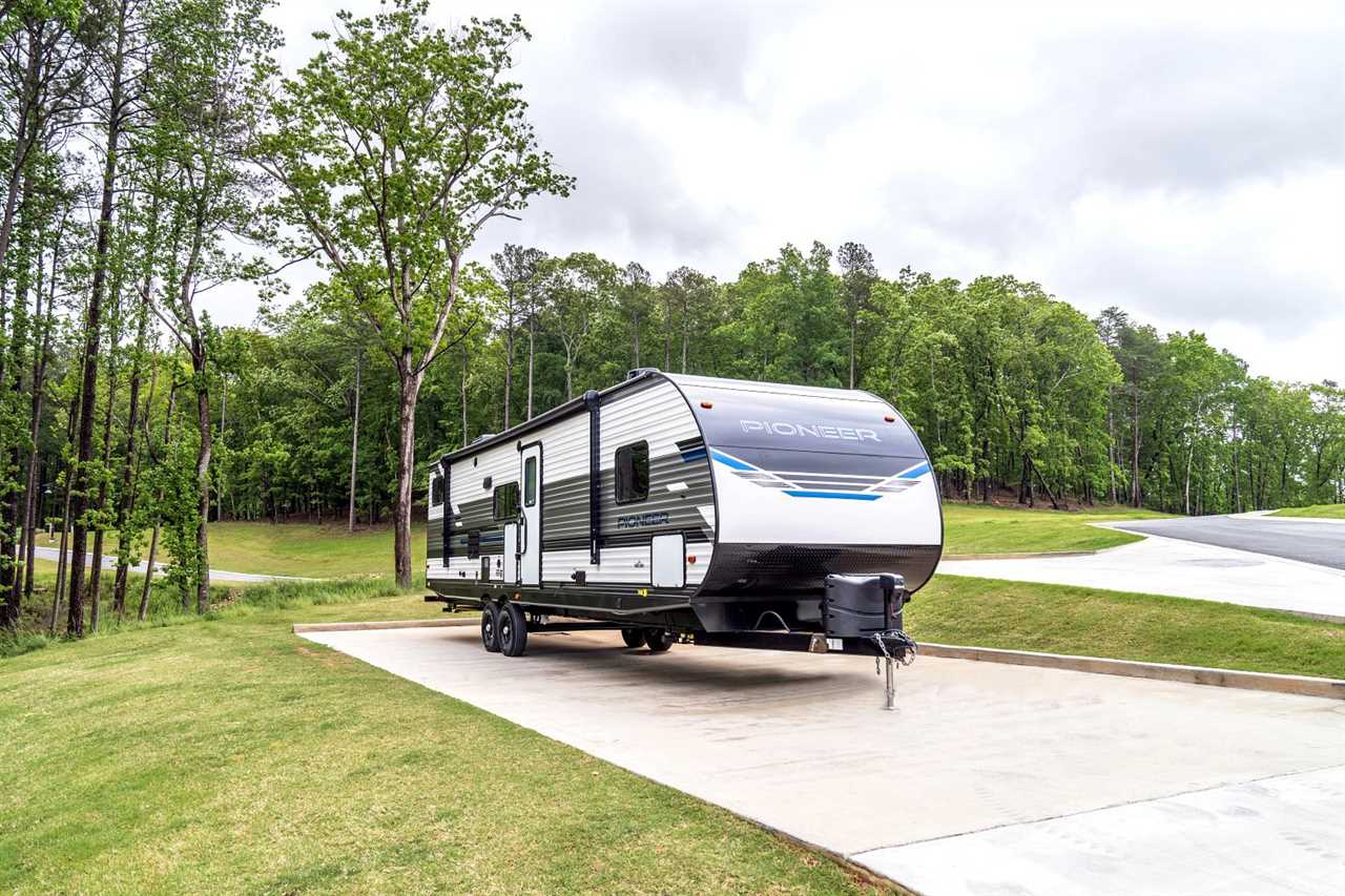 Heartland Pioneer travel trailer at campsite