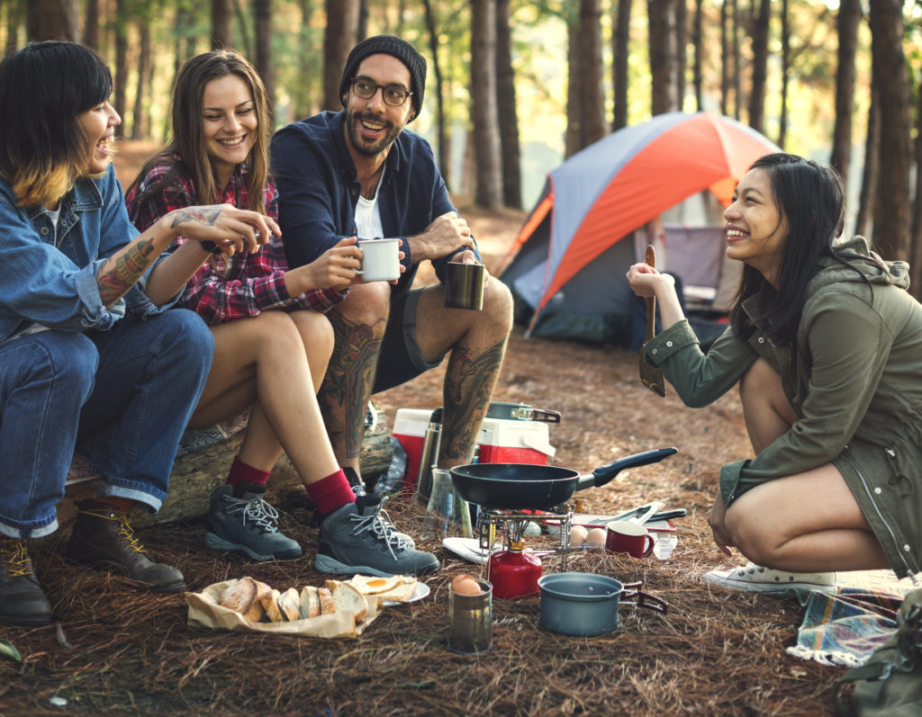 Campers Laughing at Campsite