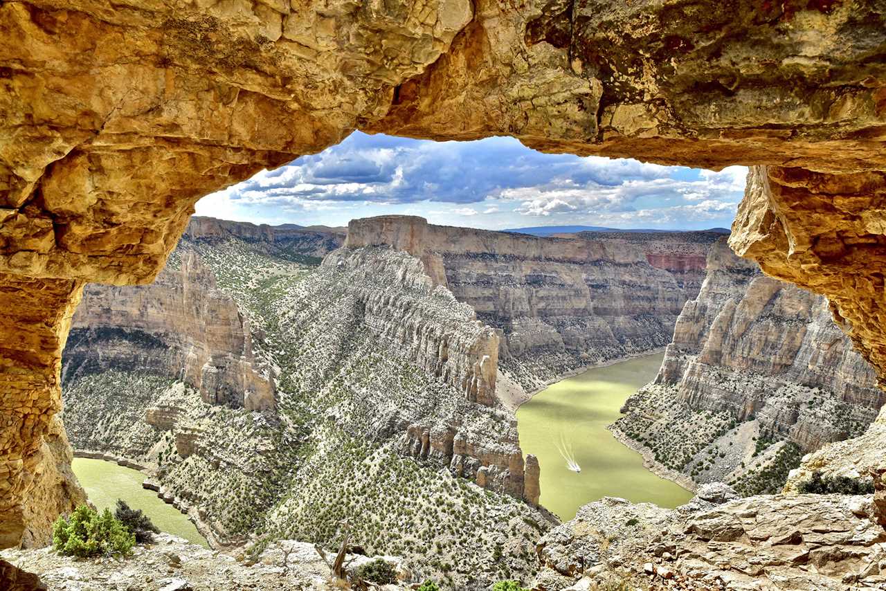 View of two rivers from an opening in rock.