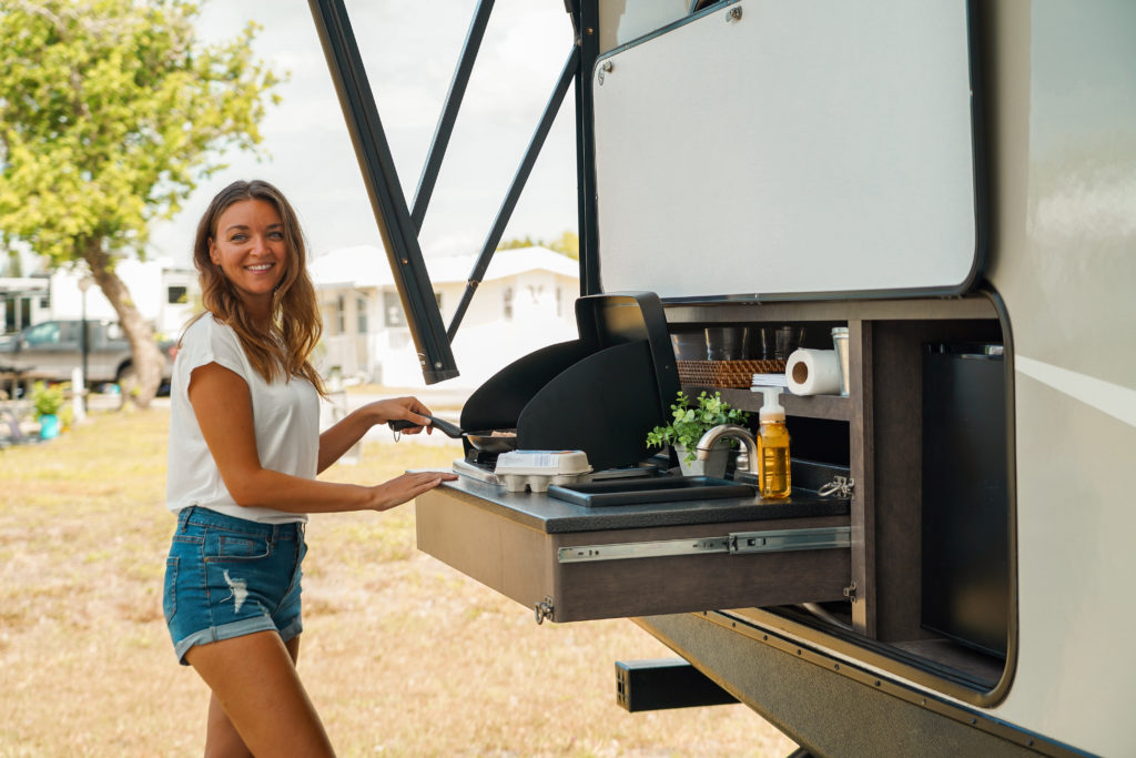 Cooking in RV Outdoor Kitchen