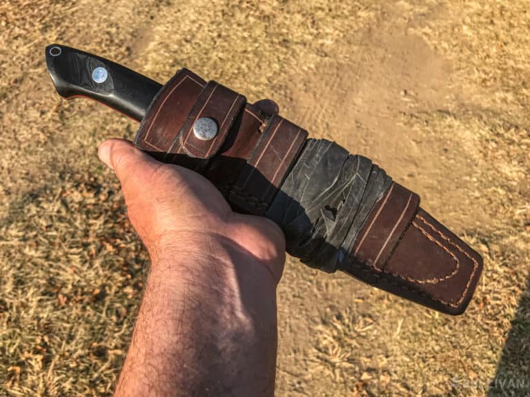 catapult wrapped around the sheath of fixed-blade knife