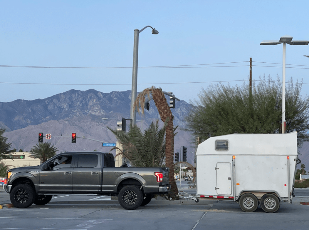 truck towing horse camper