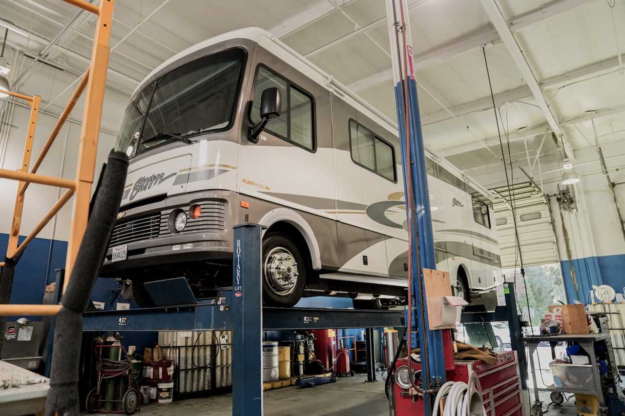 RV on a lift getting an oil change