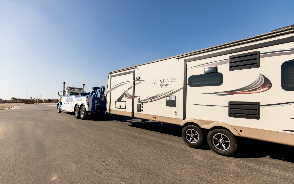 RV being towed during a roadside breakdown