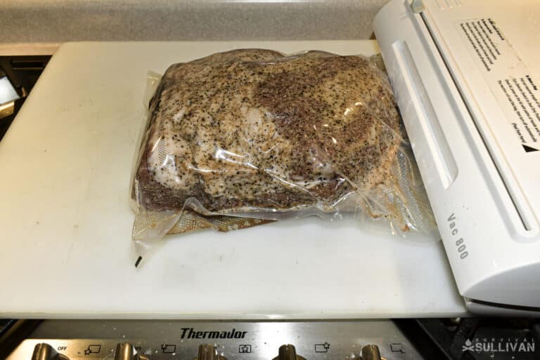 vacuum sealing a salted pork shoulder