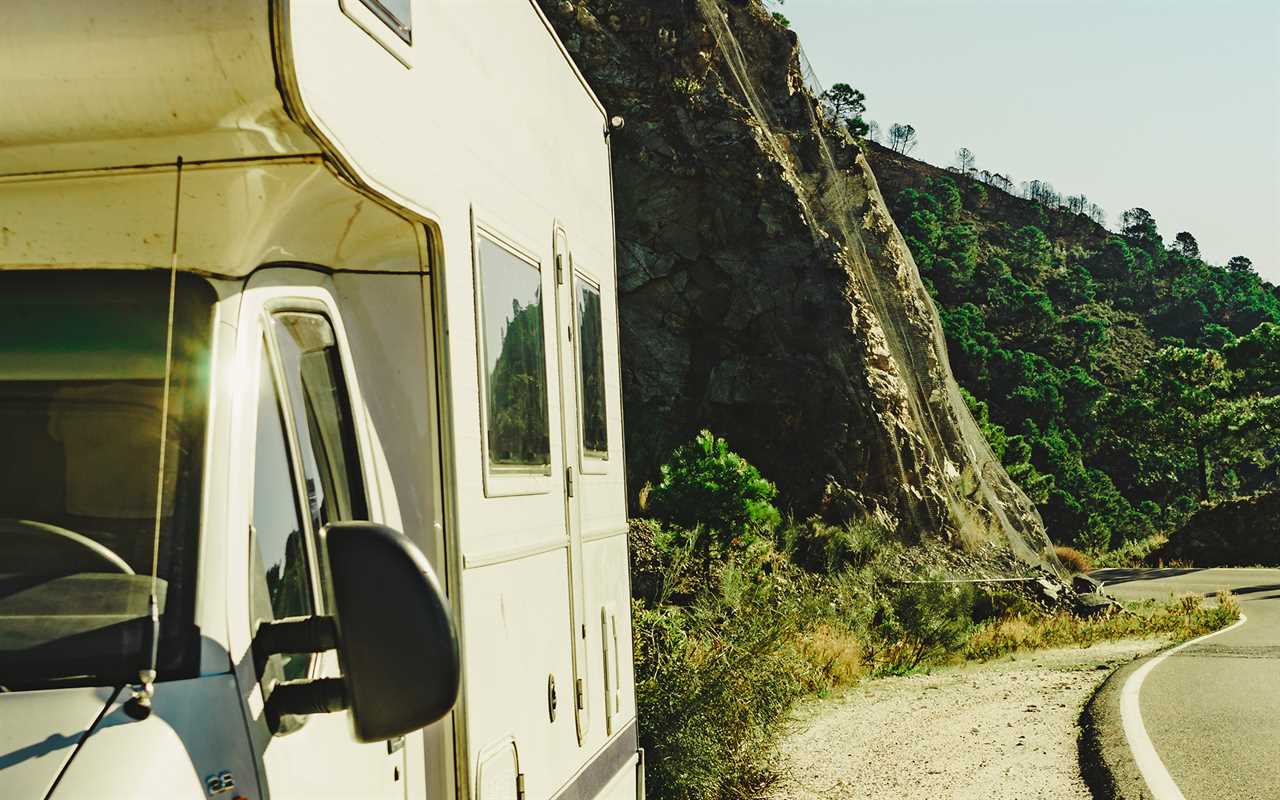 Class C motorhome stranded on shoulder of the road.