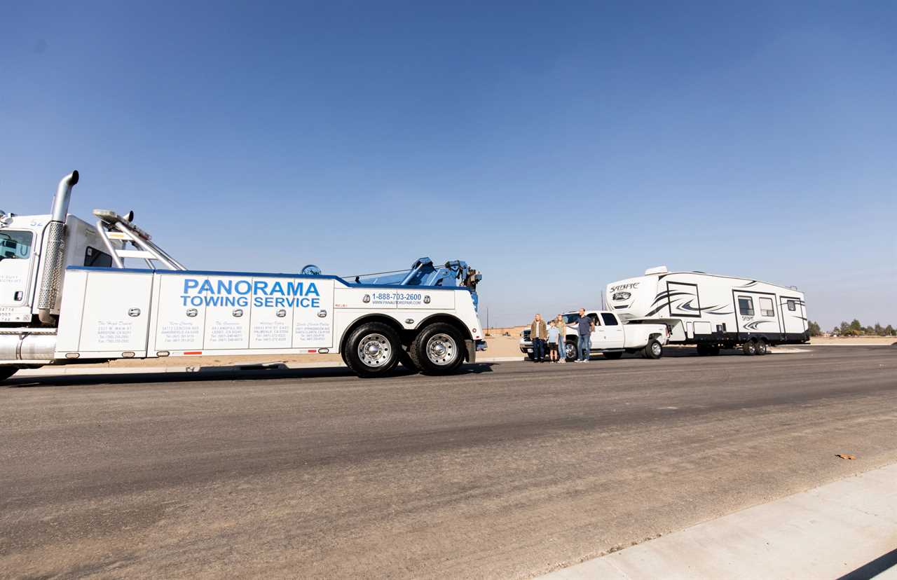 Giant tow truck ready to rescue fifth-wheel trailer.