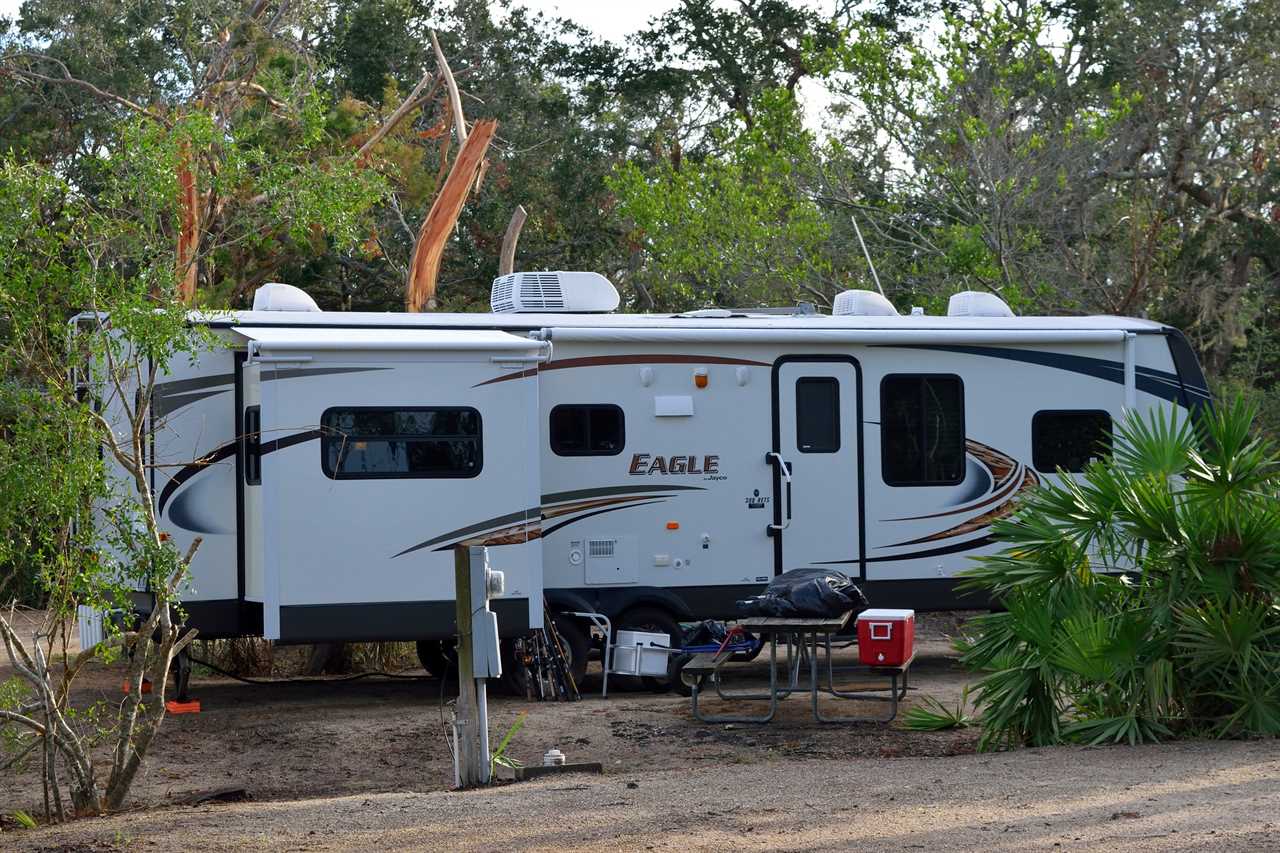 Travel Trailer parked in campsite