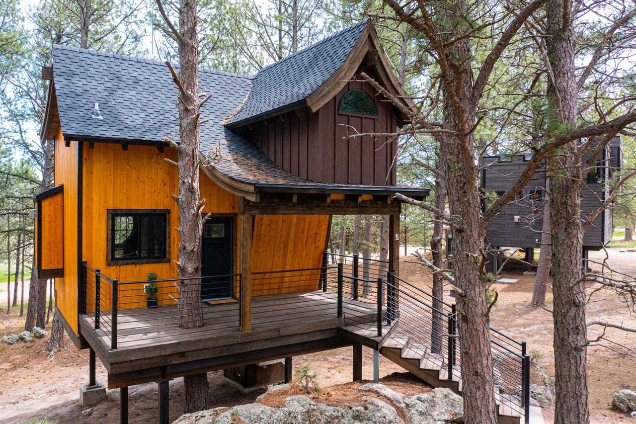 Elegant camping cabin on stilts.