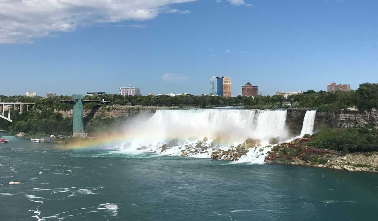 Cascade thundering into a river. 