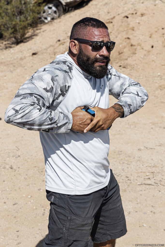 Raul Martinez demonstrates how to incapacitate a handgun before a physical altercation.