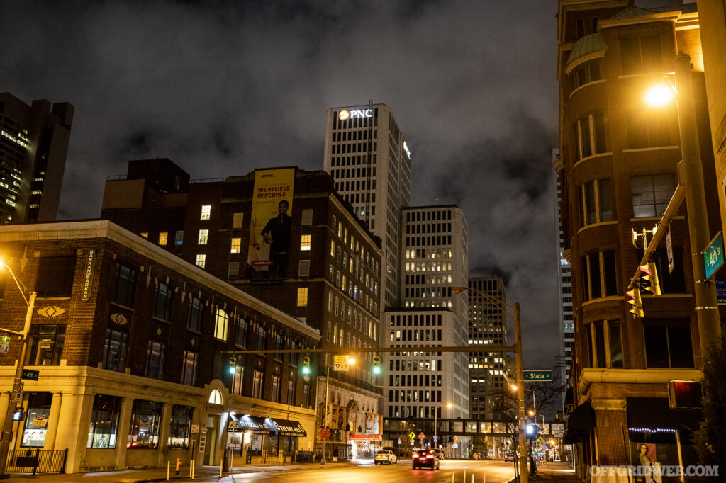 Photo of inner city buildings at night.