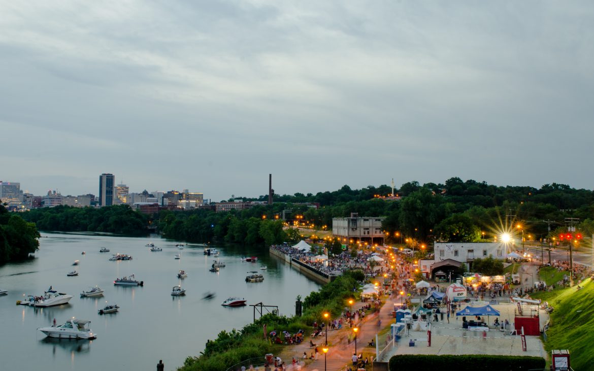 Aerial view of Richmond riverfront with sand volleyball area and boats