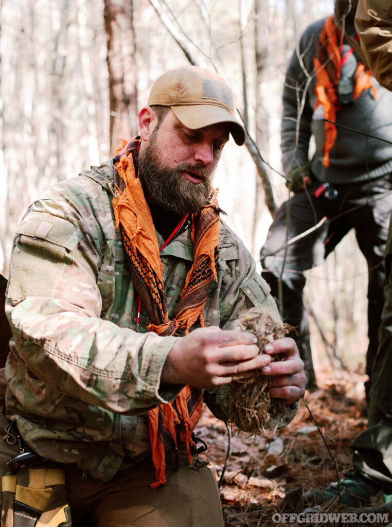 Photo of JJ Morris teaching a survival skills class.