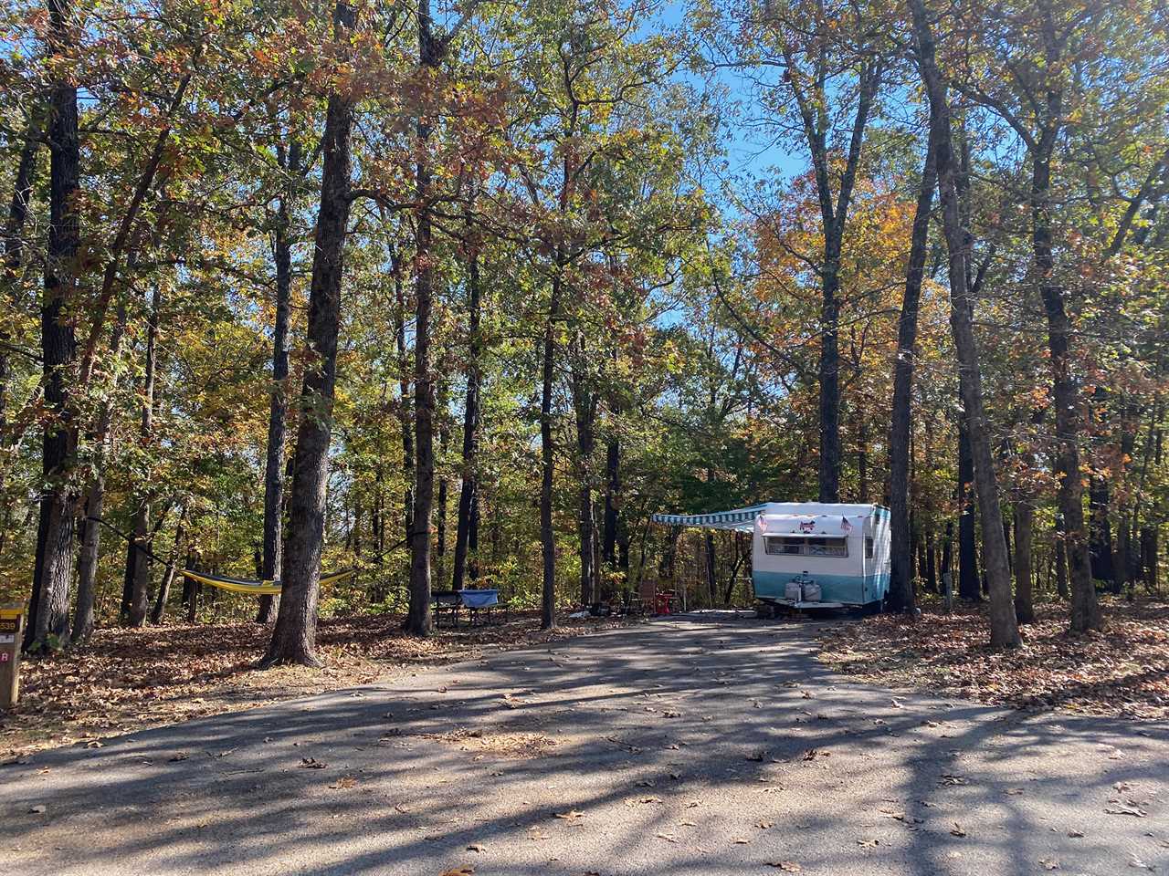 Shasta trailer in fall setting.