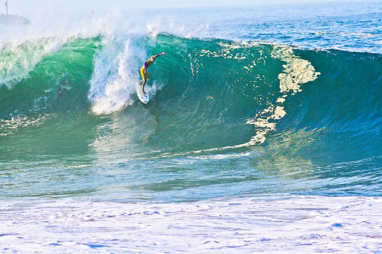 Surfing on a tall wave.