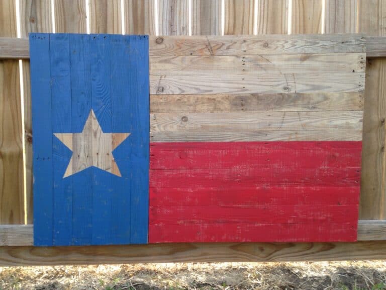 flag of Texas on a wooden board