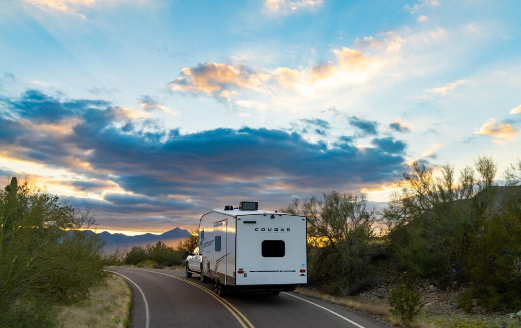 5th Wheel Driving into the Sunset