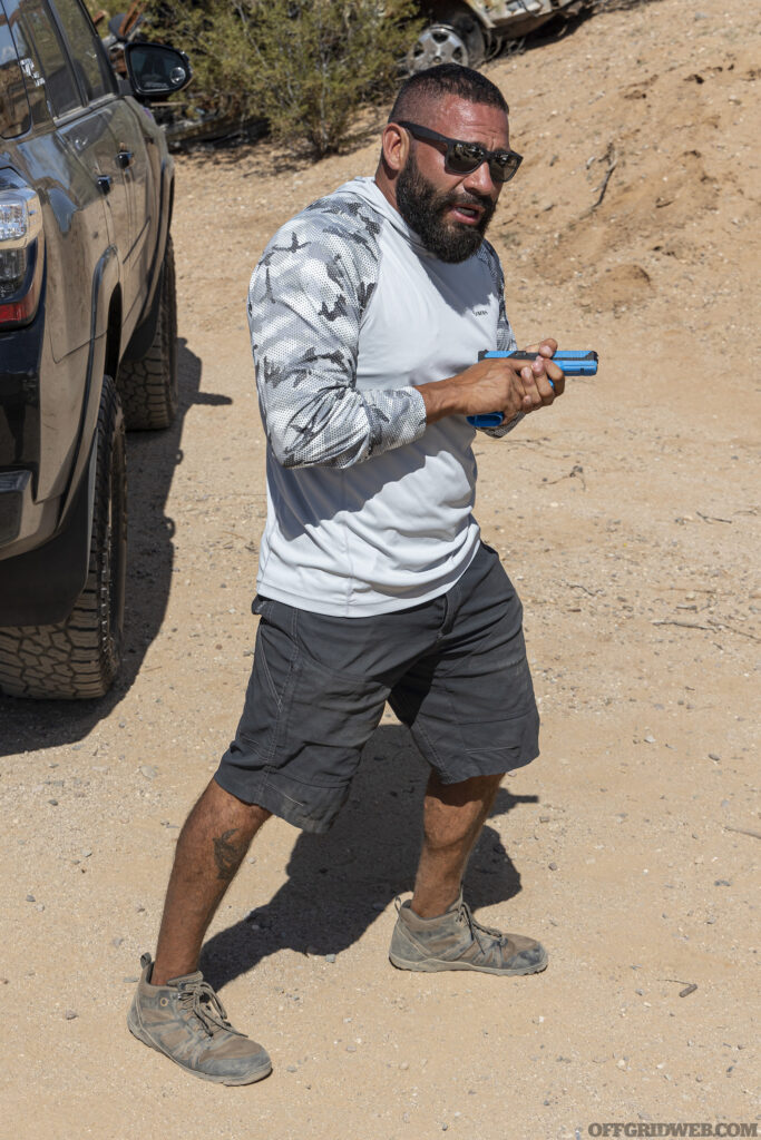 Raul Martinez demonstrating off-body holster method.