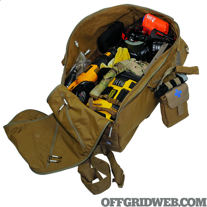 Studio photo of the bayou bug out bag contents packed in the bag.