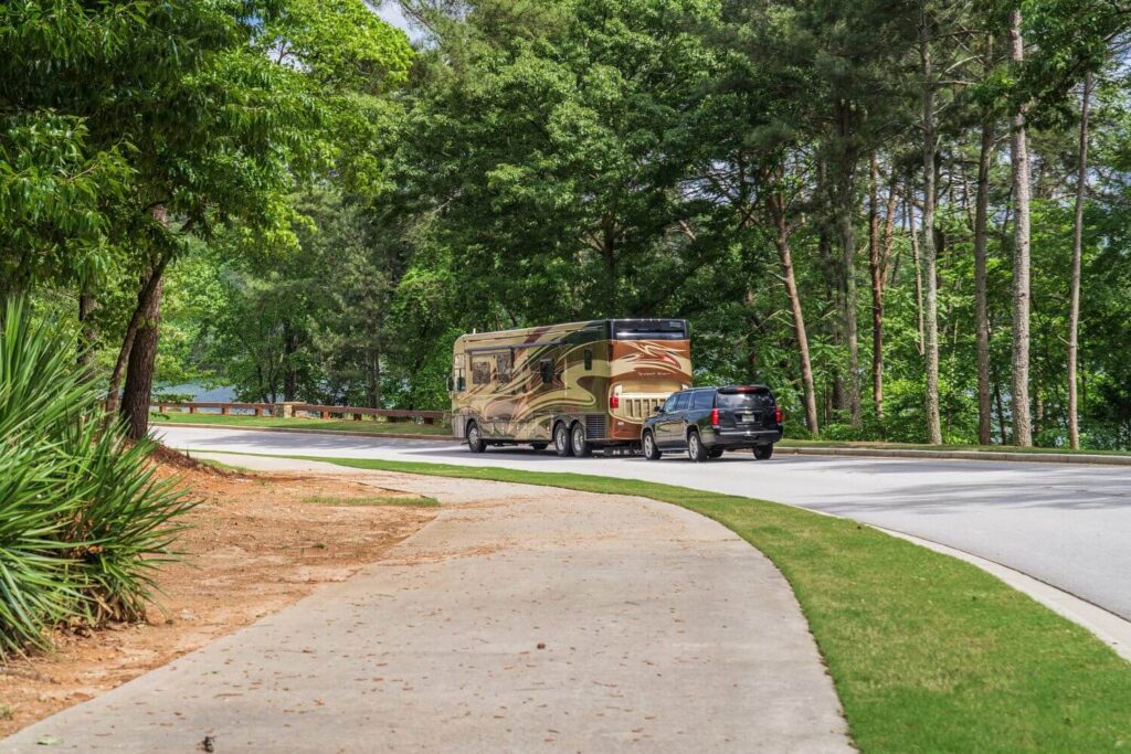 Suburban being towed by a Class A Motorhome