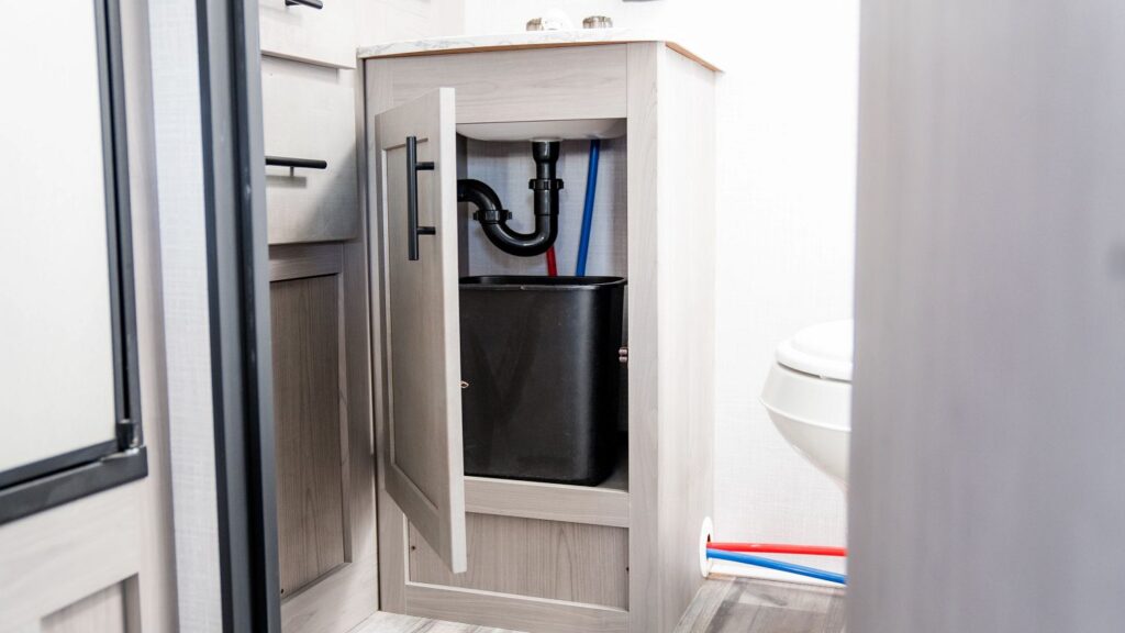 Plumbing under RV bathroom sink