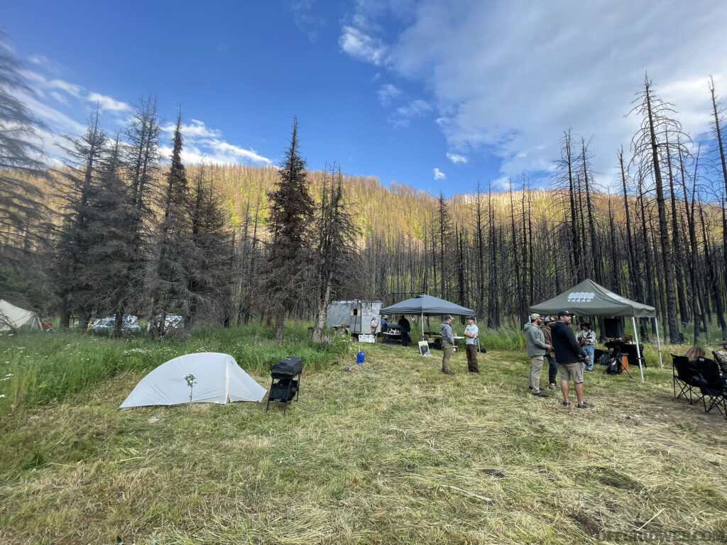 Backcountry skills summit base camp at the bottom of a montana mountain.