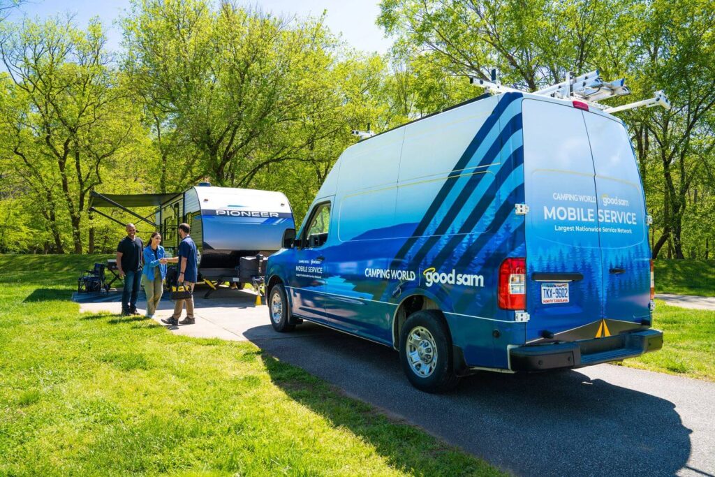 Mobile Service technician greeting RVers at campground