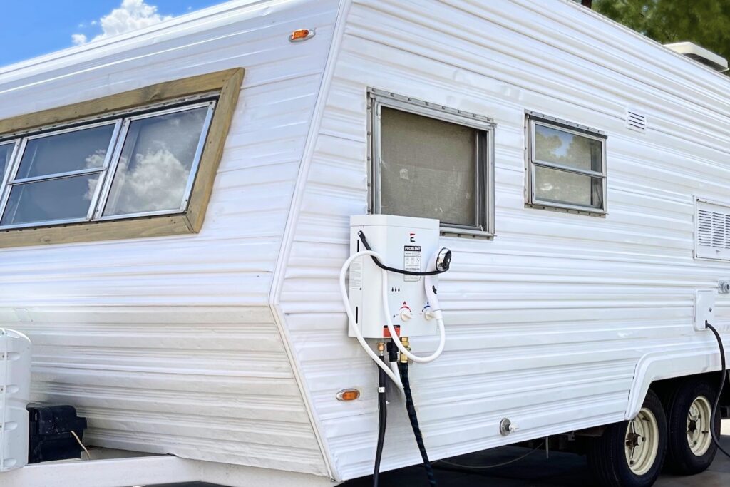 Eccotemp tankless water heater mounted on side of trailer