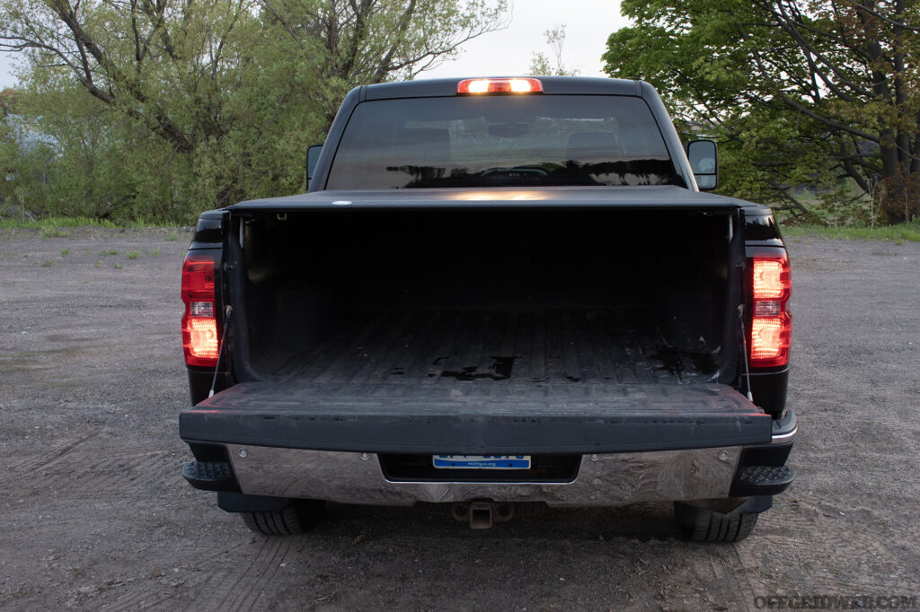 Photo of the tailgate of a chevy silverado before the benefits of LED vehicle lighting.