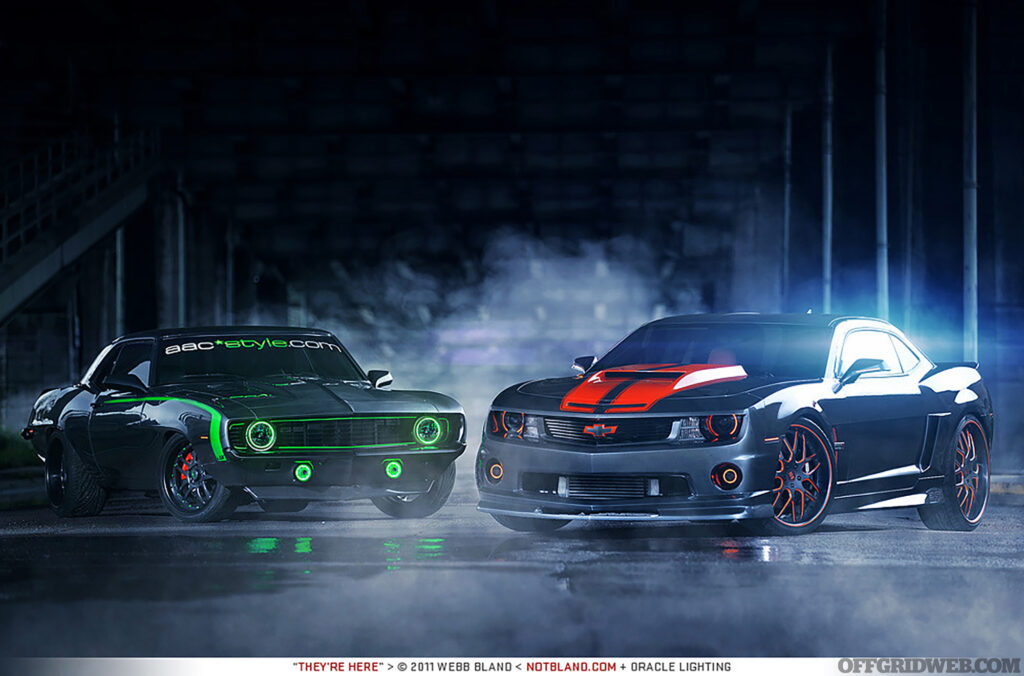 Dramatic photo of two sports cars that have been upgraded with Oracle Lighting LEDs.