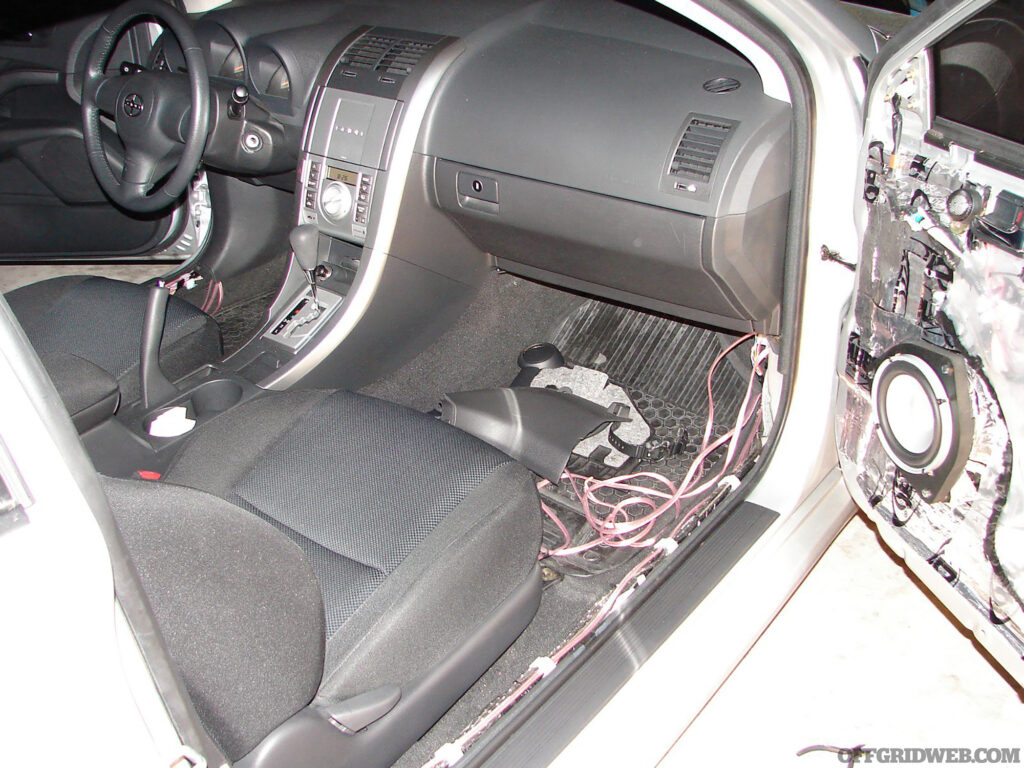 Photo of a vehicles wiring being modified.