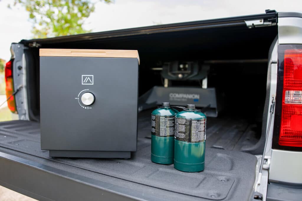 Ukiah Firepit and Propane Canisters on Truck Tailgate