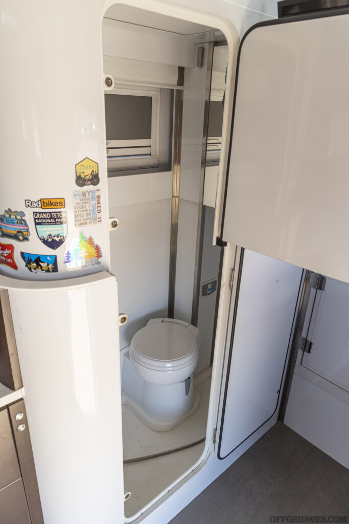 Photo of the bathroom stall inside the mil spec overland LMTV.