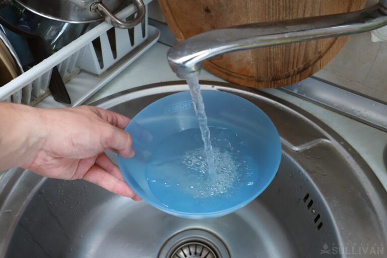 collecting water in plastic container