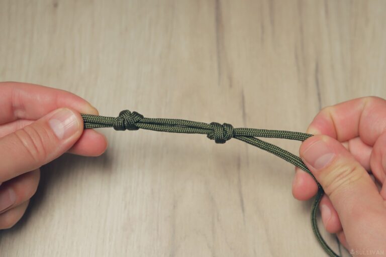 double fisherman’s knot tightening the second knot