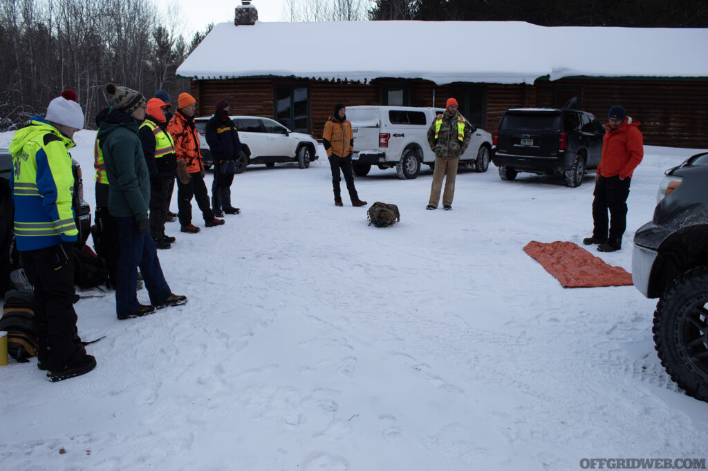 Photo of students introducing themselves during the start of winter survival training.