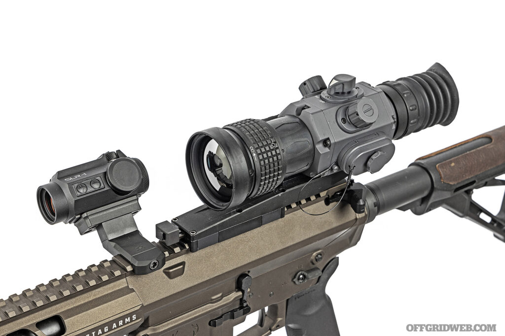 Studio photo of an armasight thermal optic mounted to a stag arms rifle.