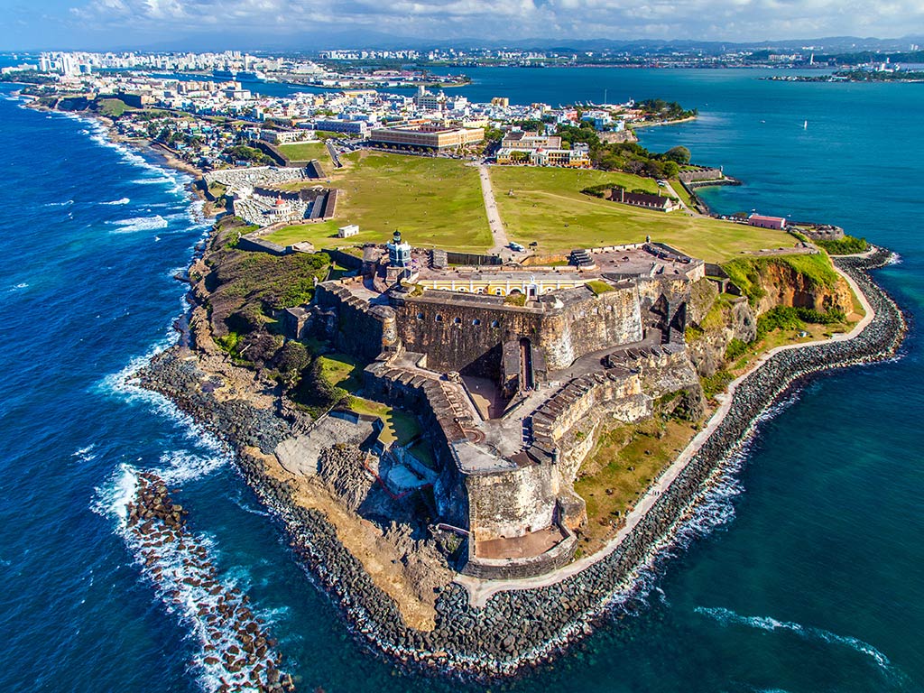 An aerial view of the fort in San Juan, Puerto Rico, with the city visible in the background, as the peninsula of the city is visible, surrounded by water