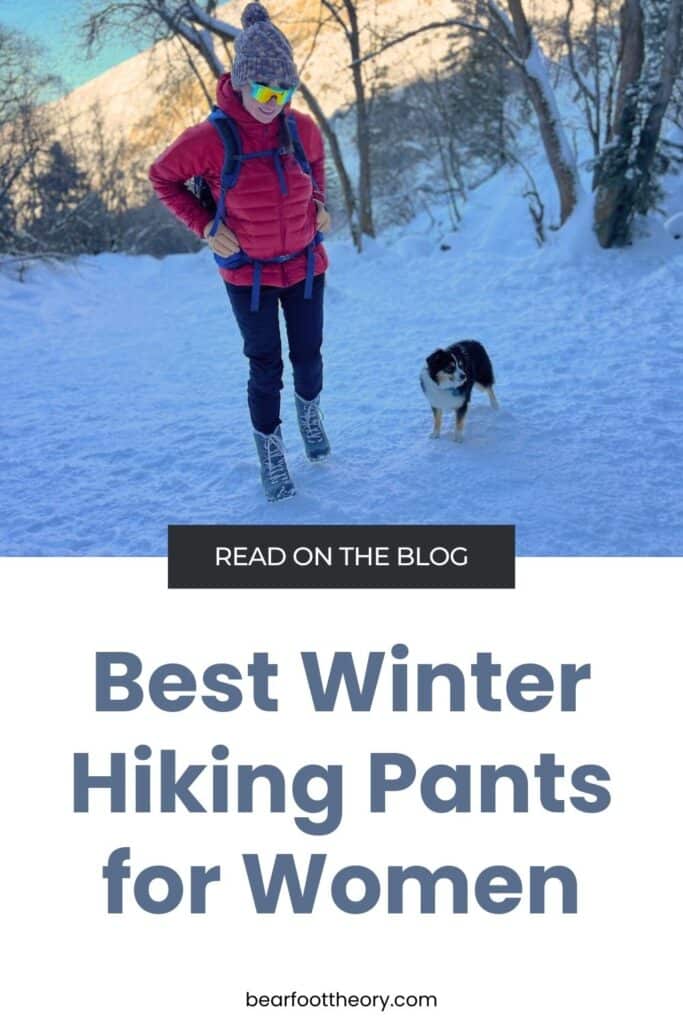 A pinnable image of a woman and a mini-aussie puppy on a winter hike with the text "Read on the blog - best winter hiking pants for women"