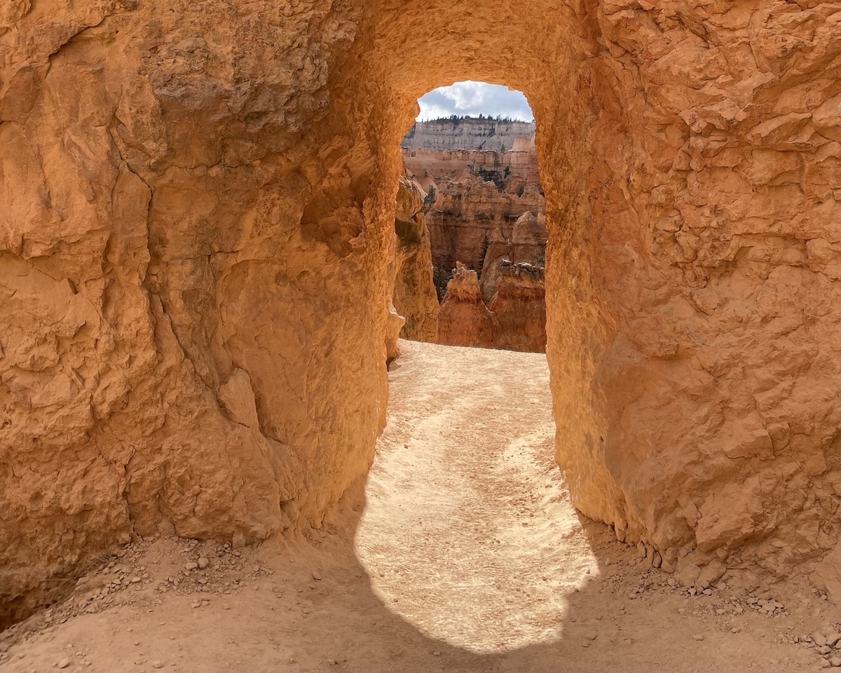 Tunnel inside the fin of a hoodoo along the Queens Garden Trail in Bryce Canyon National Park.