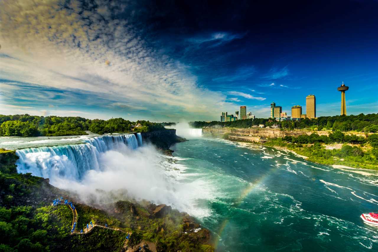 Waterfalls cascade over a sharp escarpment.