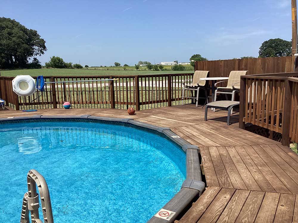 Pool with a wooden deck