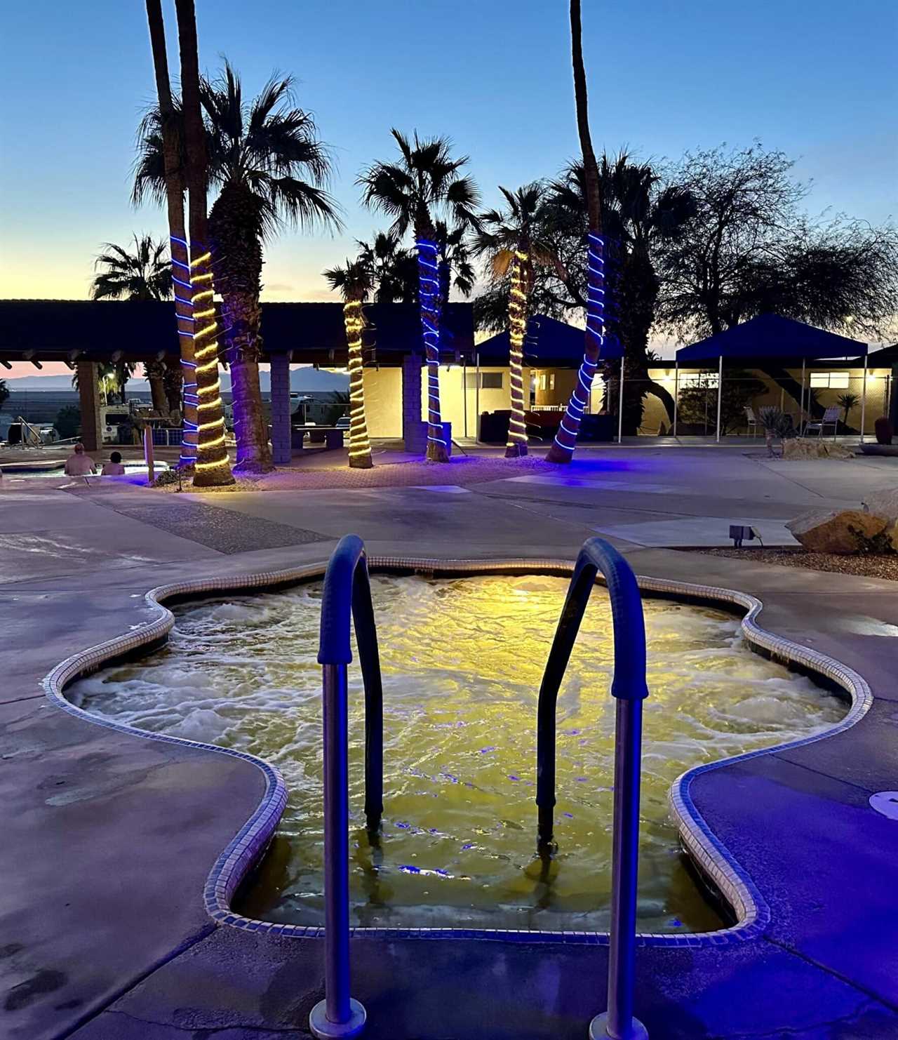 An amoeba-shaped hot tub welcomes travelers. 