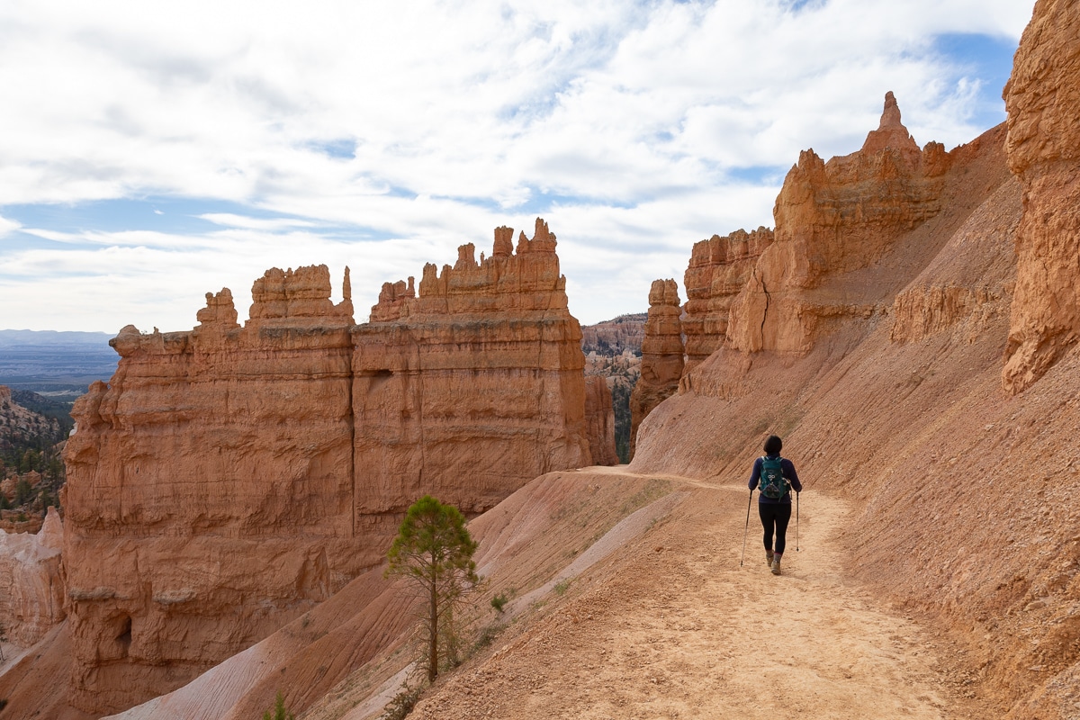 Woman hiking along the Peekaboo Loop Trail in Bryce Canyon National Park.